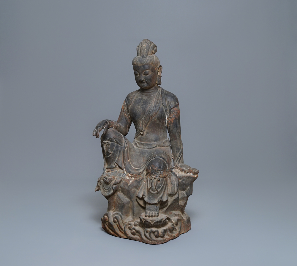 A large Chinese cast iron figure of Guanyin with inscription on the back, Ming/Qing