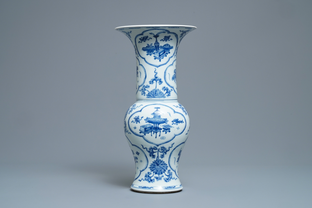 A Chinese blue and white yenyen vase with antiquities and flowers, Kangxi
