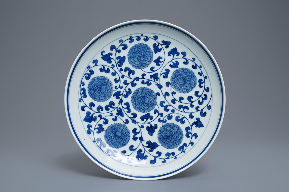 A Chinese blue and white 'peony scroll' dish, marked 'Made in Jingdezhen in 1955'