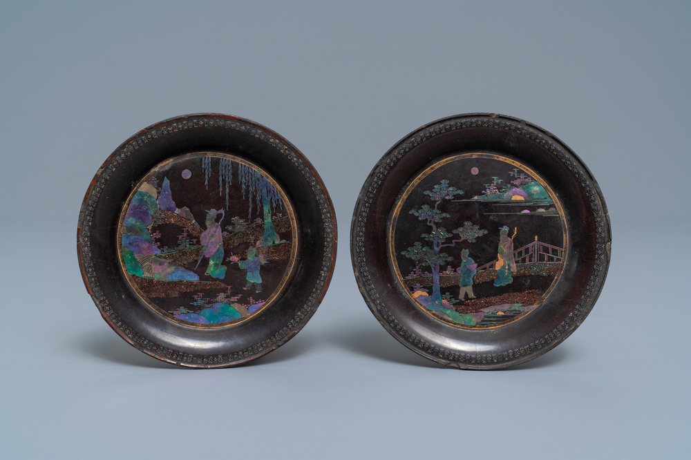 A pair of Chinese lac burgaut&eacute; saucer dishes, Kangxi