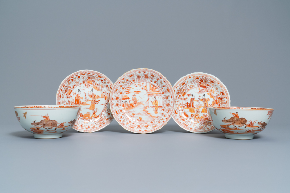 Three Chinese iron red and gilt plates and two bowls, Kangxi/Yongzheng