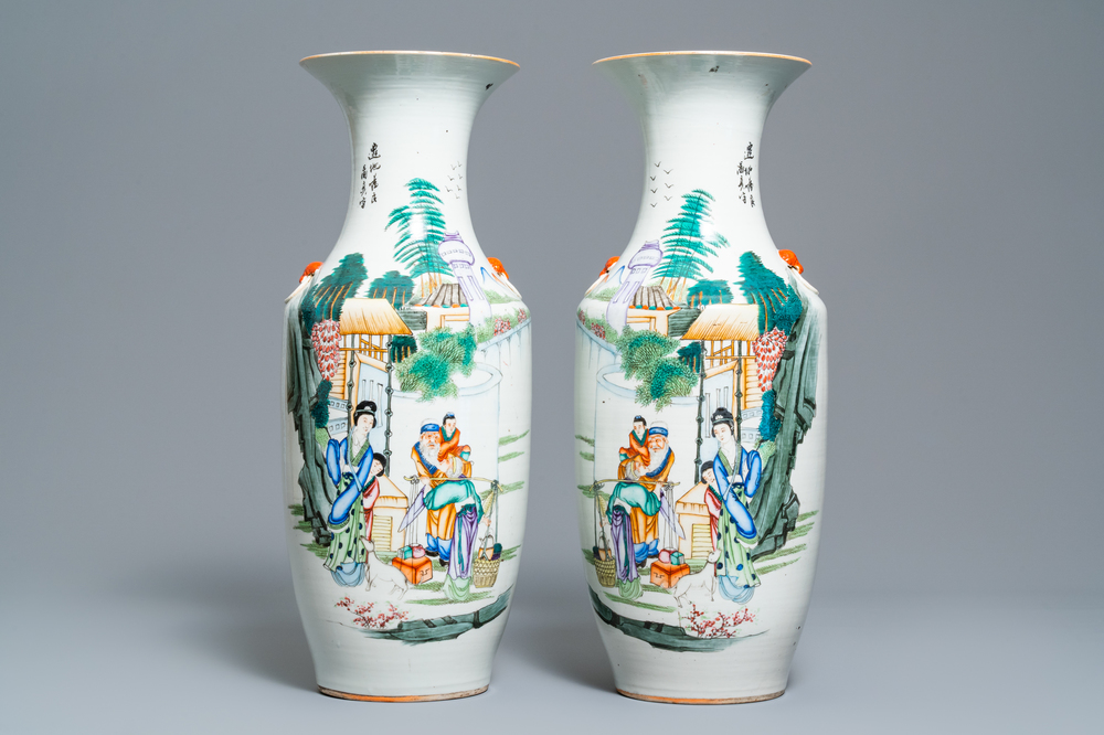 A pair of Chinese famille rose vases with figures in a garden, 19/20th C.