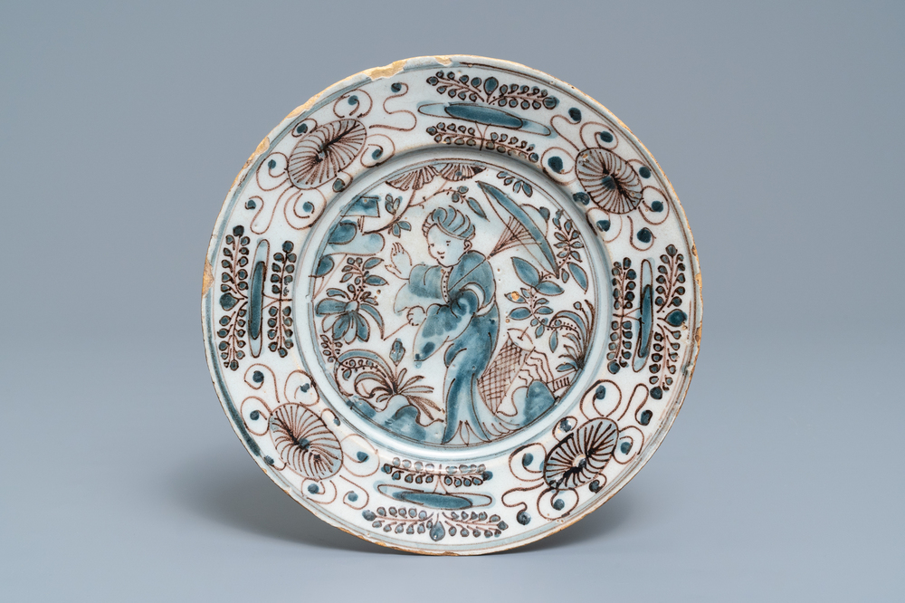 A blue, white and manganese Portuguese faience plate, 3rd quarter 17th C.