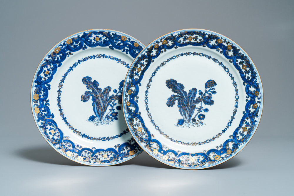 A pair of Chinese gilt-decorated blue and white chargers, Qianlong