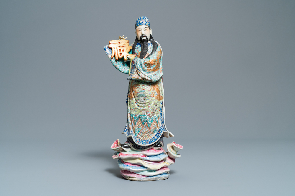 A Chinese famille rose figure of an immortal, 19/20th C.