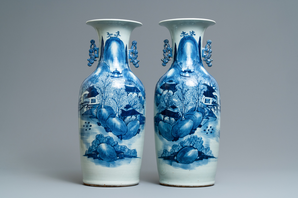 A pair of Chinese blue and white 'landscape' vases, 19th C.