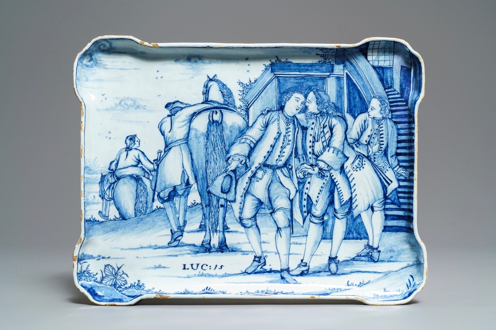 A Dutch Delft blue and white 'Return of the prodigal son' tray, 18th C.