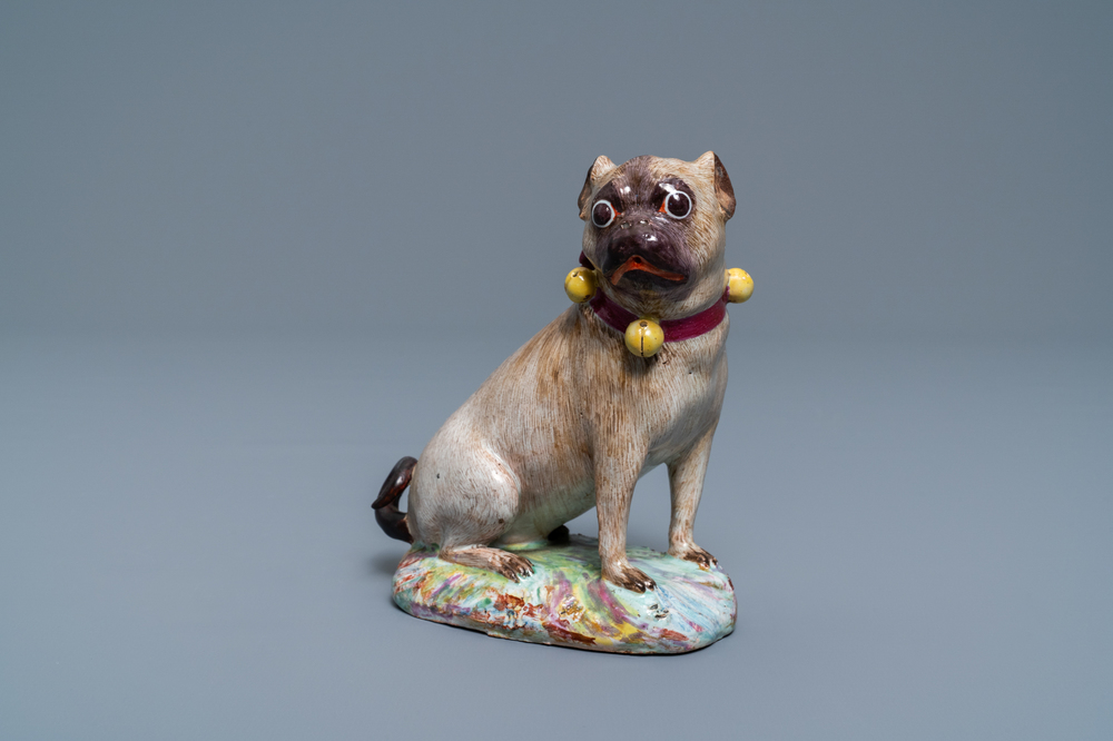 A polychrome Tournai faience model of a pug, 18th C.