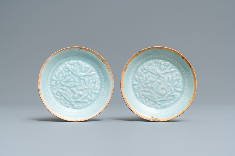 A pair of Chinese qingbai moulded saucer dishes, Song