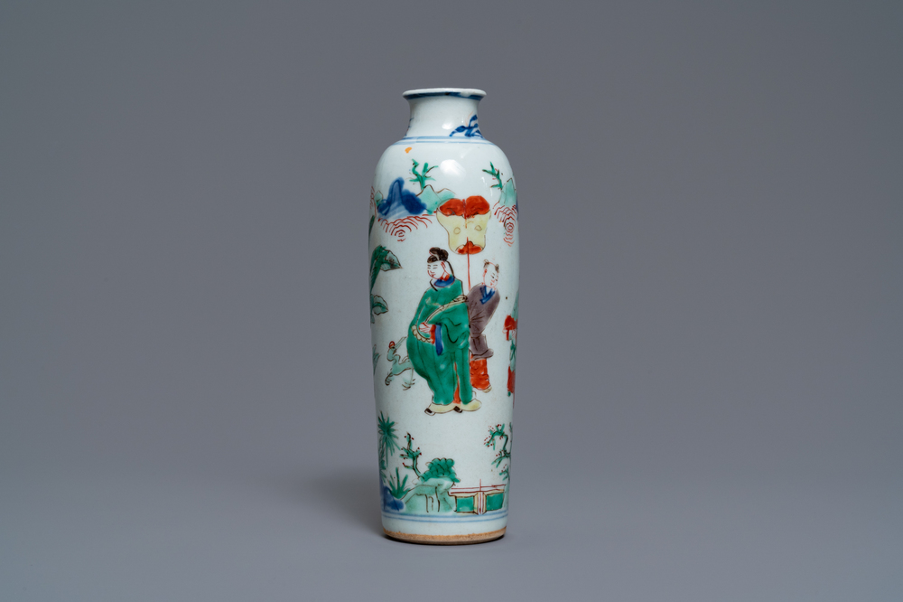 A Chinese wucai rouleau vase with figures in a landscape, Transitional period