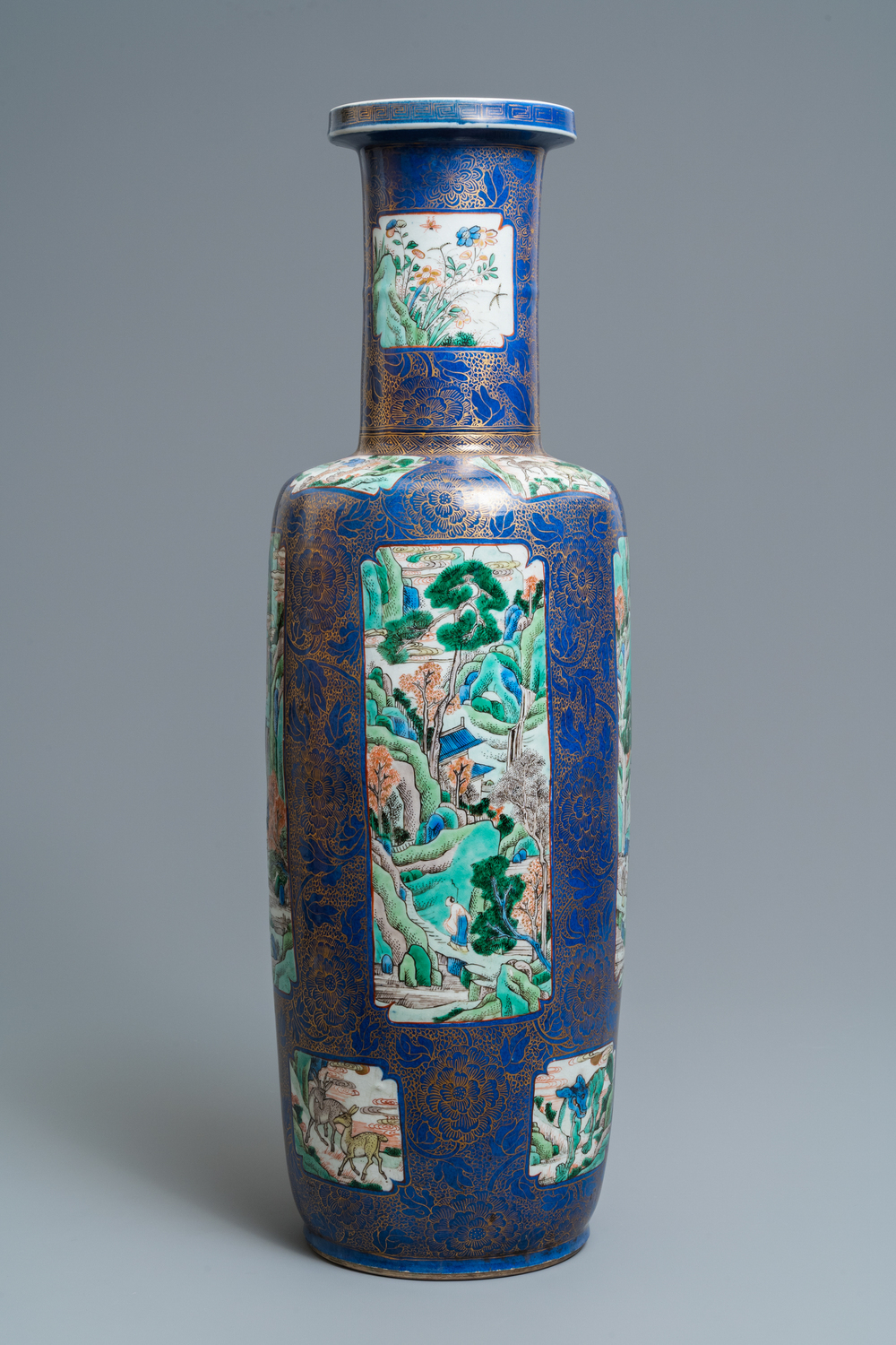 A massive Chinese famille verte on powder blue-ground rouleau vase, Kangxi