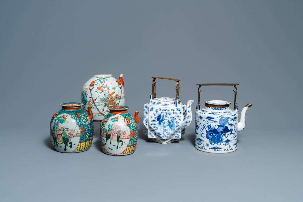 Two large Chinese blue and white and three famille rose teapots, 19/20th C.