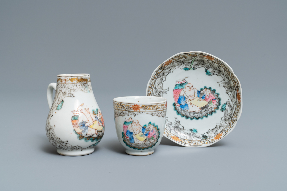 A Chinese famille rose and grisaille cup and saucer with matching jug, Yongzheng