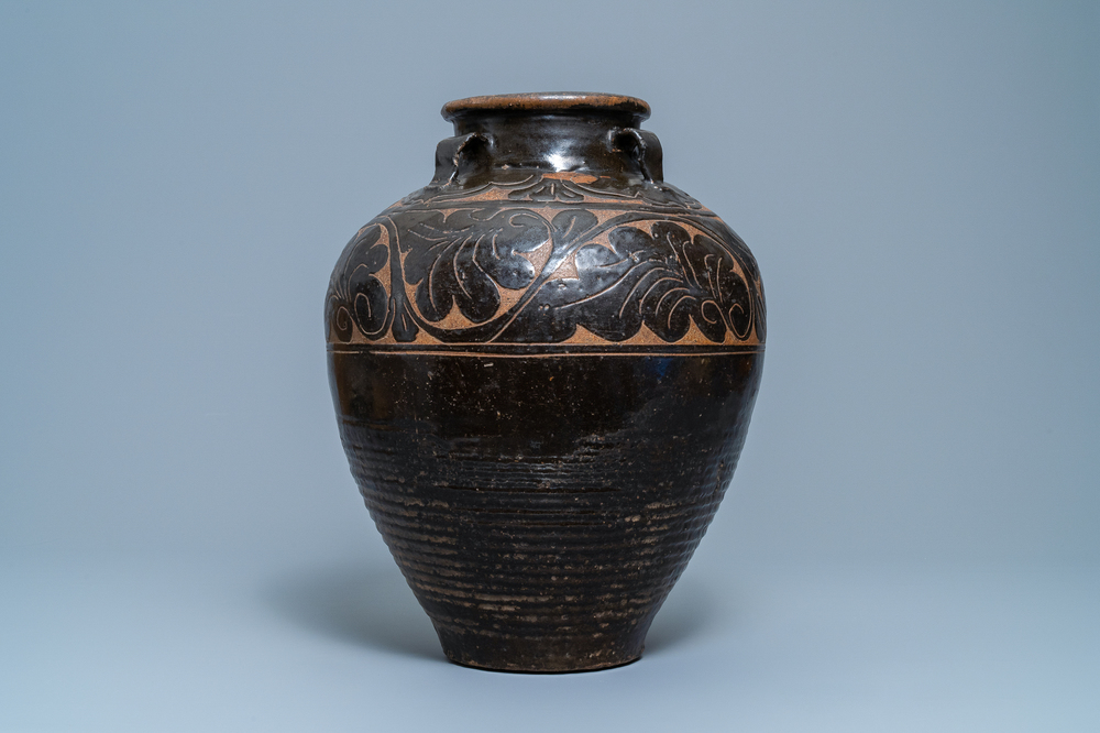 A large Chinese Cizhou vase with engraved floral design, Yuan/Ming