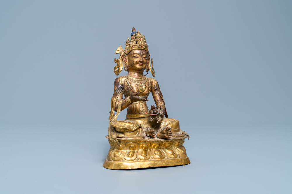 A Sino-Tibetan gilt copper alloy figure of Buddha, 18/19th C.