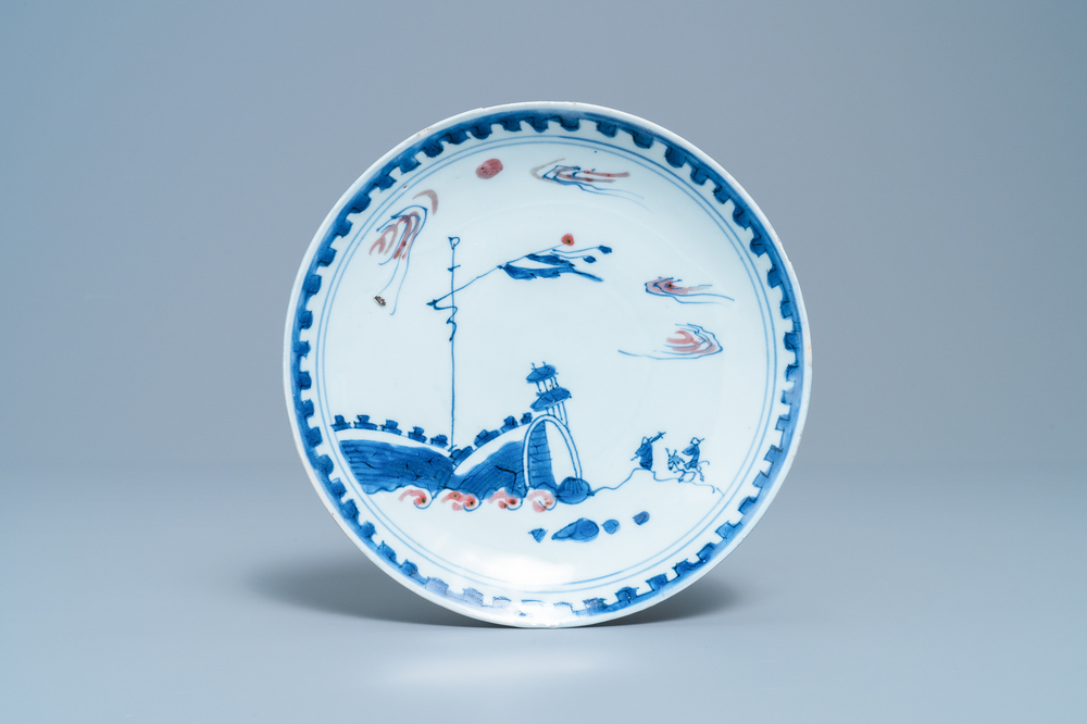 A Chinese blue, white and copper red plate, Ming