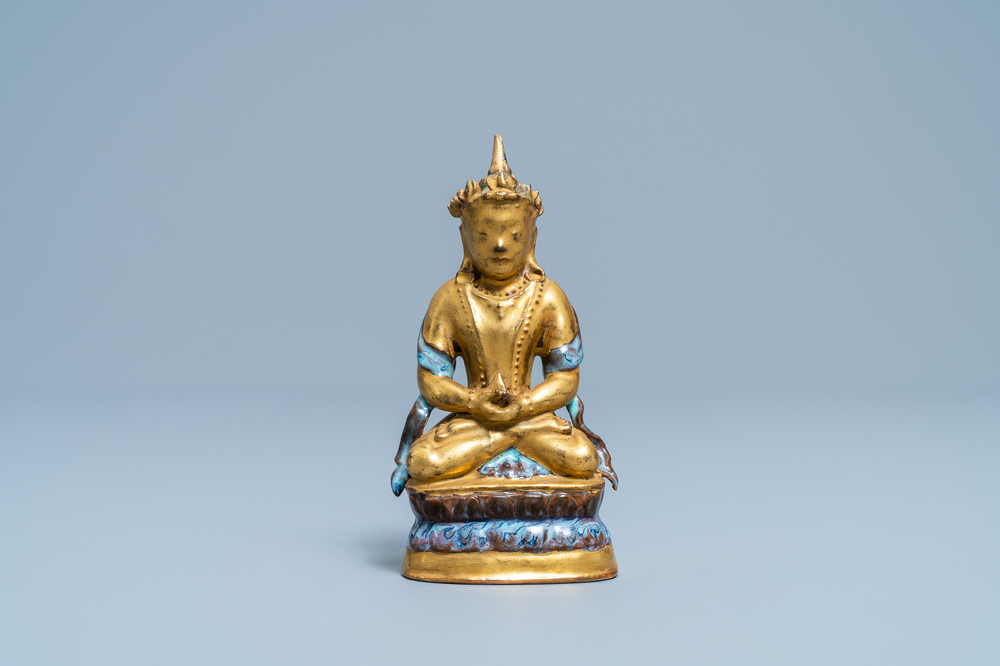 A Chinese gilt and parcel-flamb&eacute; glazed figure of a Bodhisattva, 19/20th C.