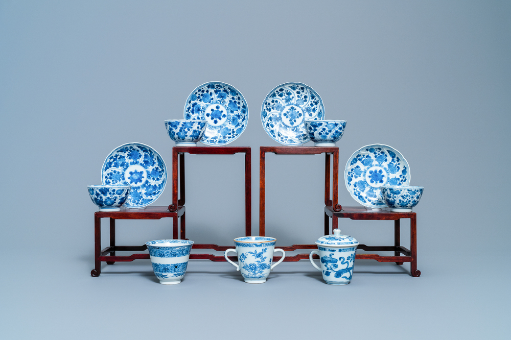 Four Chinese blue and white cups and saucers and three large cups, Kangxi/Qianlong