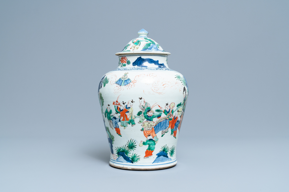 A Chinese wucai 'playing boys' vase and cover, Transitional period