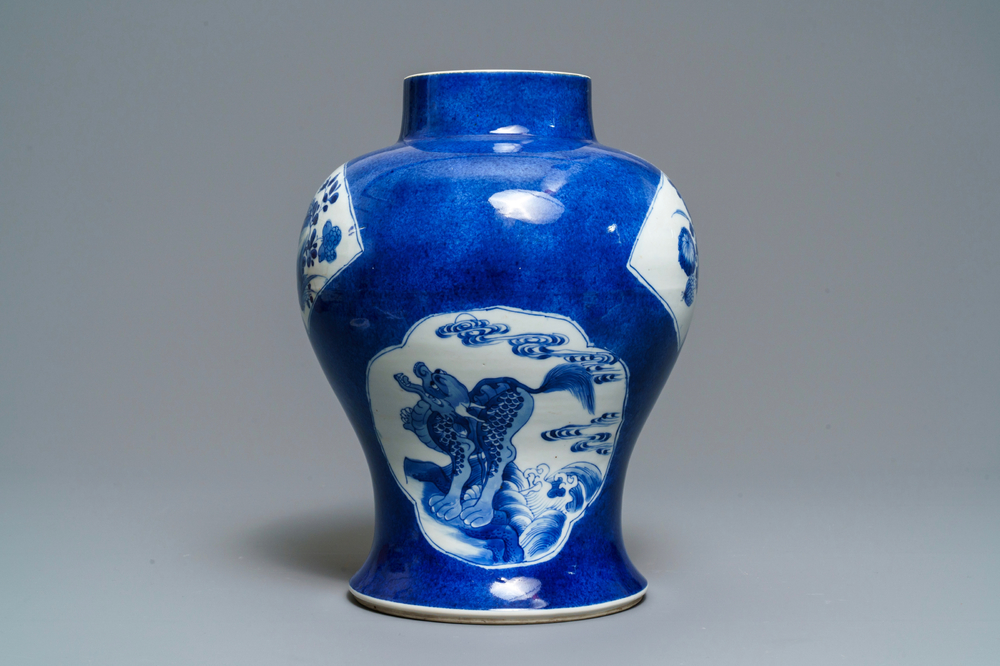 A Chinese blue and white powder blue-ground vase, Kangxi