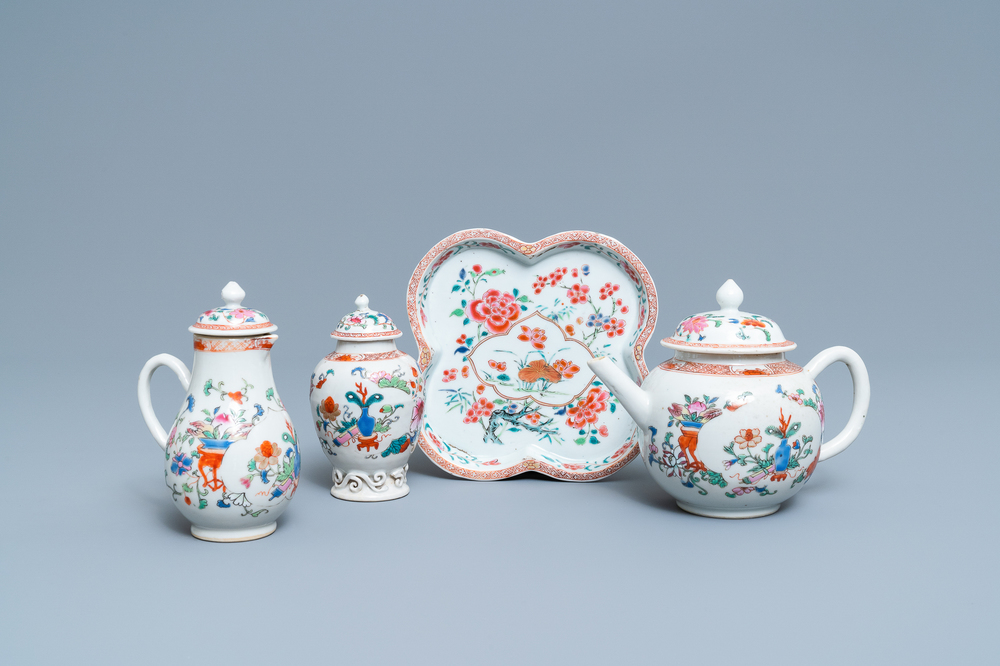 A Chinese famille rose teapot, tea caddy, milk jug and tray, Qianlong