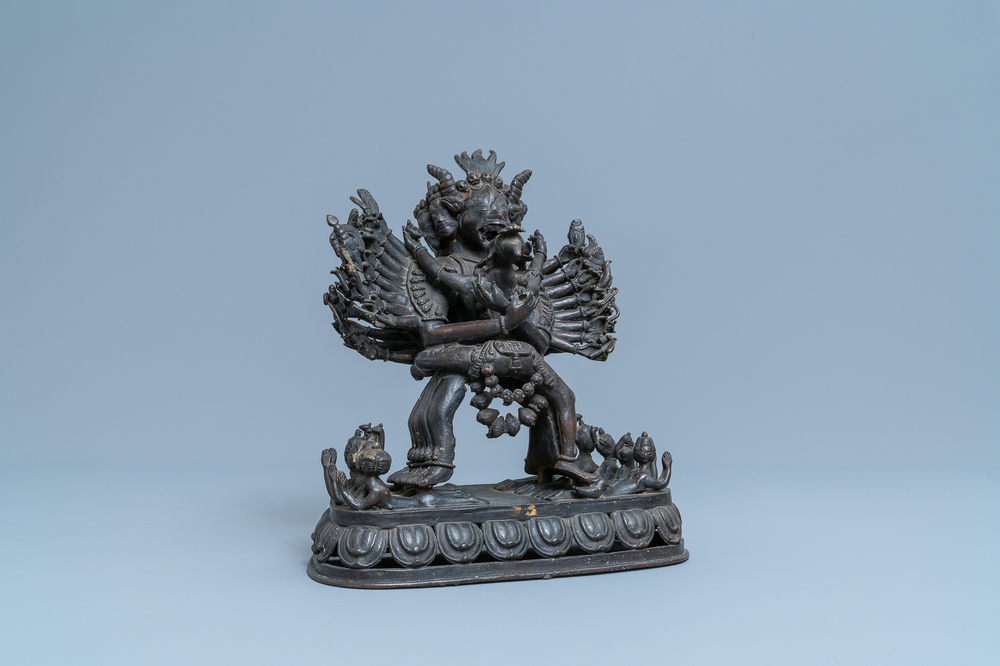 A Tibetan bronze group of Mahakala and his consort Yab-Yum, 19th C.