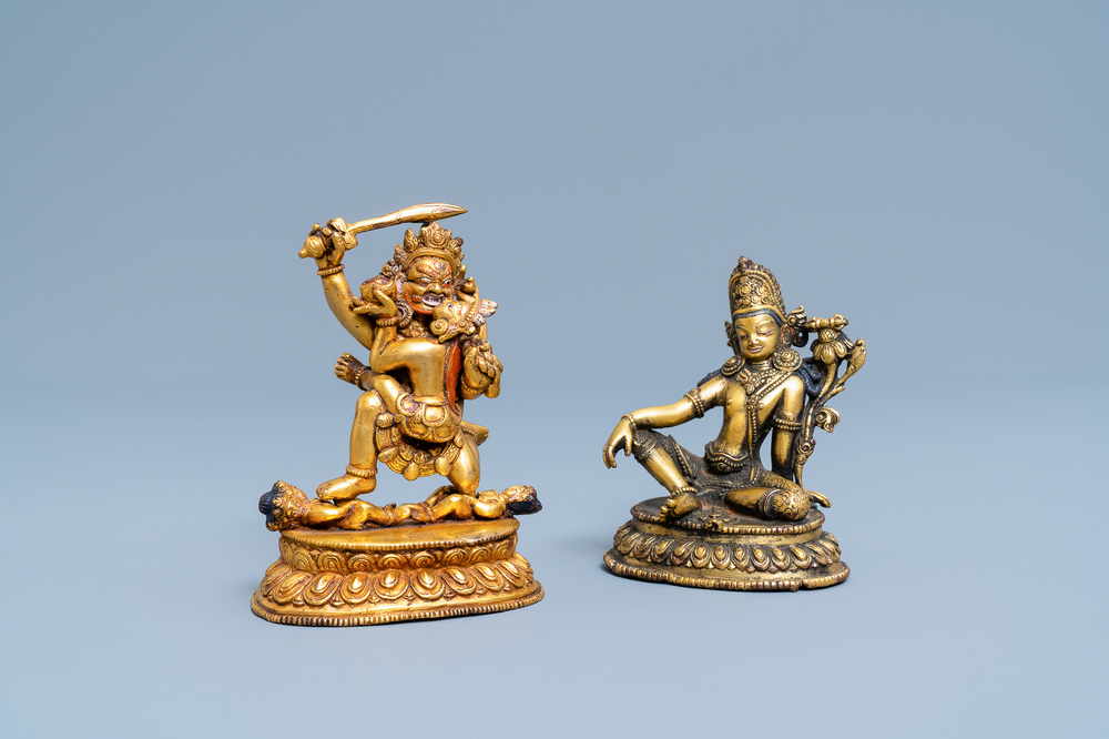 Two Sino-Tibetan gilt bronze figures, 19th C.