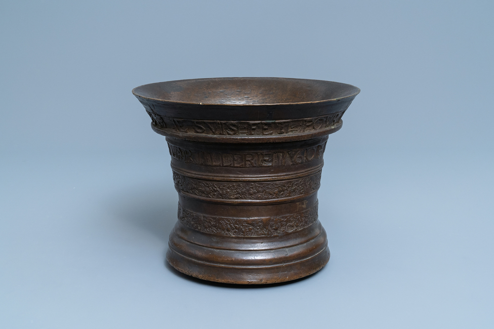 A large Flemish bronze mortar dated 1604 and inscribed Lille