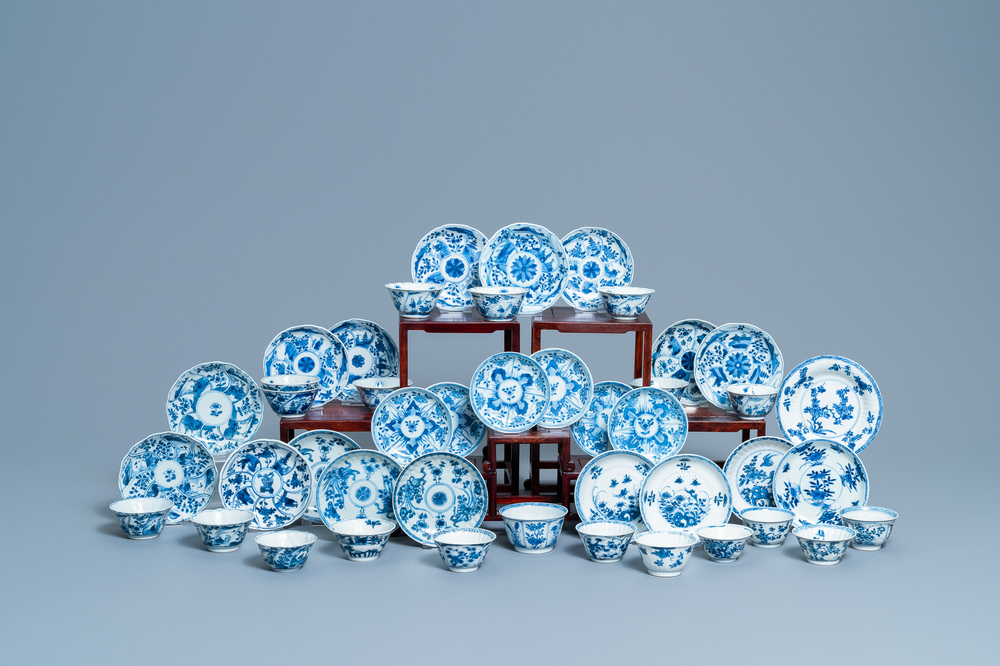 Twenty Chinese blue and white cups and twenty-four saucers, Kangxi