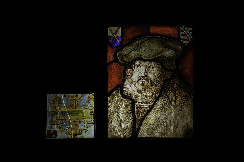 Two stained glass fragments, Flanders or France, one dated 1532