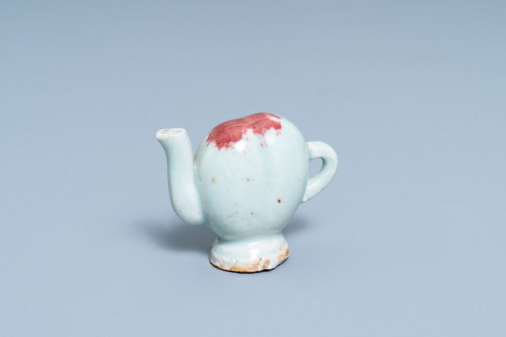 A Chinese miniature peach-shaped cadogan teapot with junyao glaze, Kangxi/Qianlong