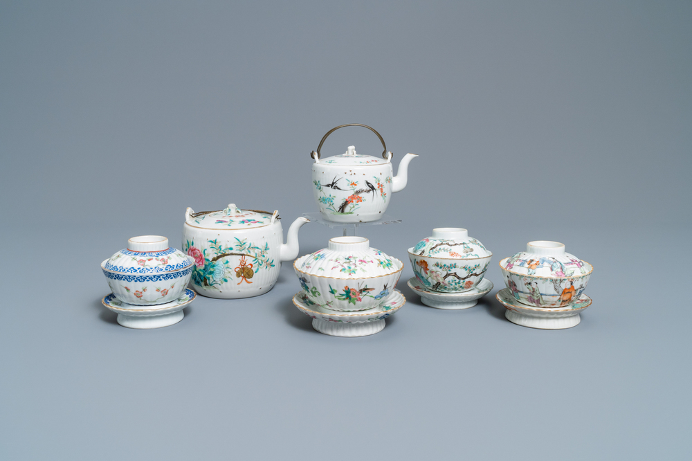 Two Chinese famille rose teapots and four covered bowls on stands, 19th C.