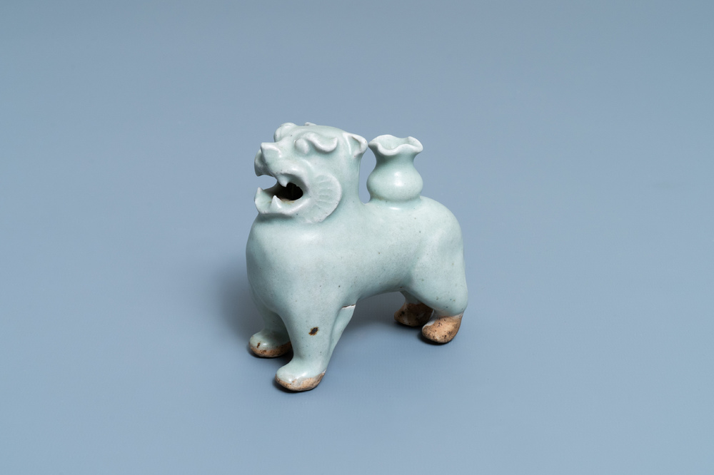 A Chinese qingbai joss stick holder in the shape of a tiger, Ming