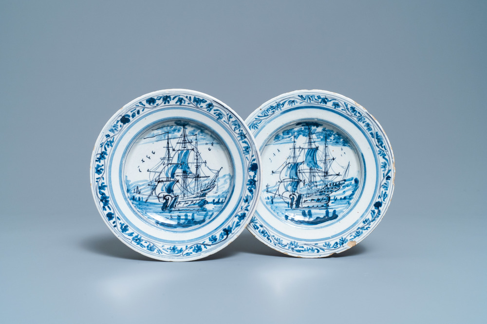 A pair of Dutch Delft blue and white plates with threemasters, 18th C.