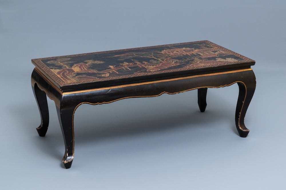 A Chinese rectangular lacquered wood table for the European market, 19th C.