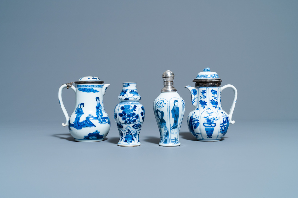 Two Chinese blue and white ewers and covers and two small vases, Kangxi