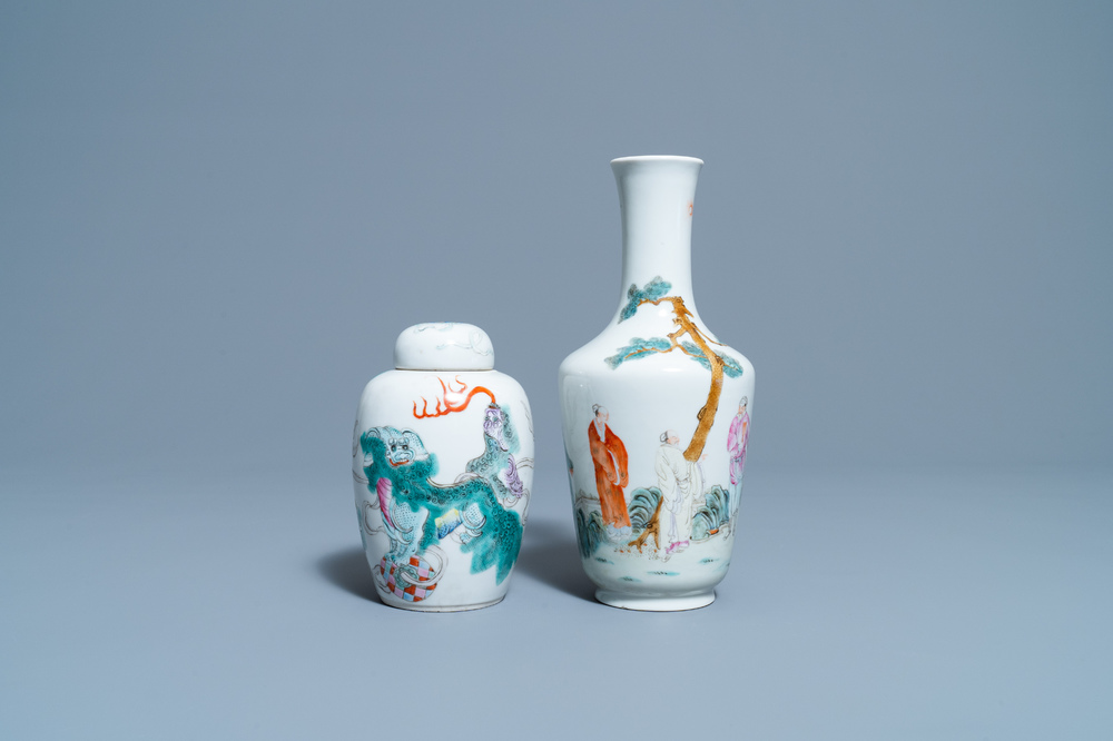 A Chinese famille rose vase and a covered jar with Buddhist lions, 19/20th C.