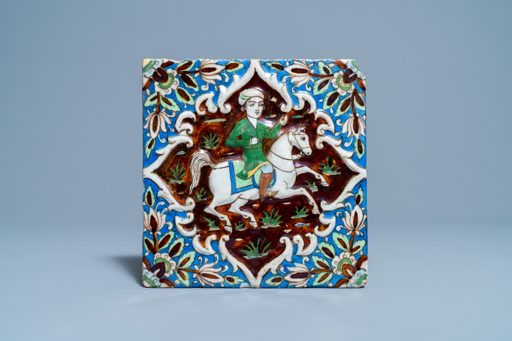 Een polychrome reli&euml;ftegel met een prins te paard, Qajar, Iran, 19e eeuw