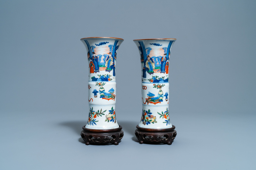 A pair of Chinese wucai 'gu' vases, 19th C.