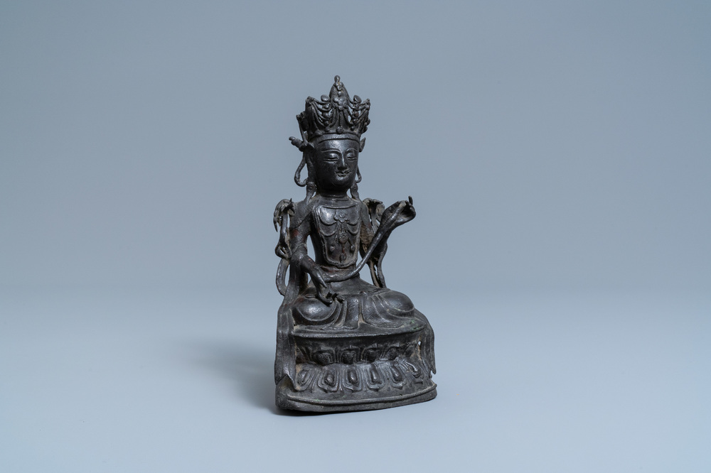 A Chinese bronze figure of Buddha, Ming