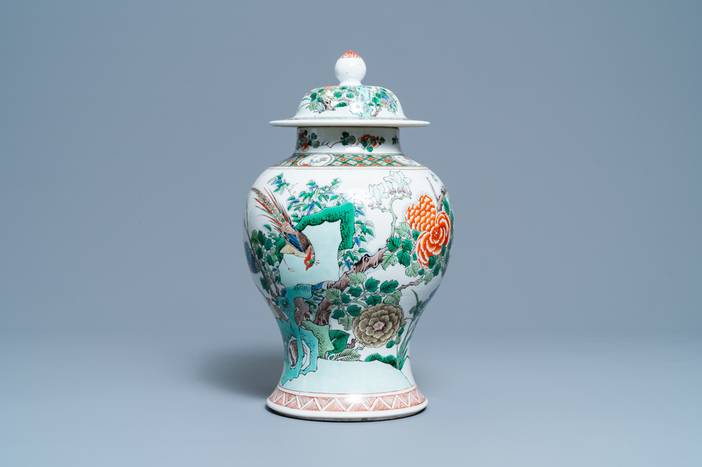 A Chinese famille verte vase and cover, Kangxi mark, 19th C.