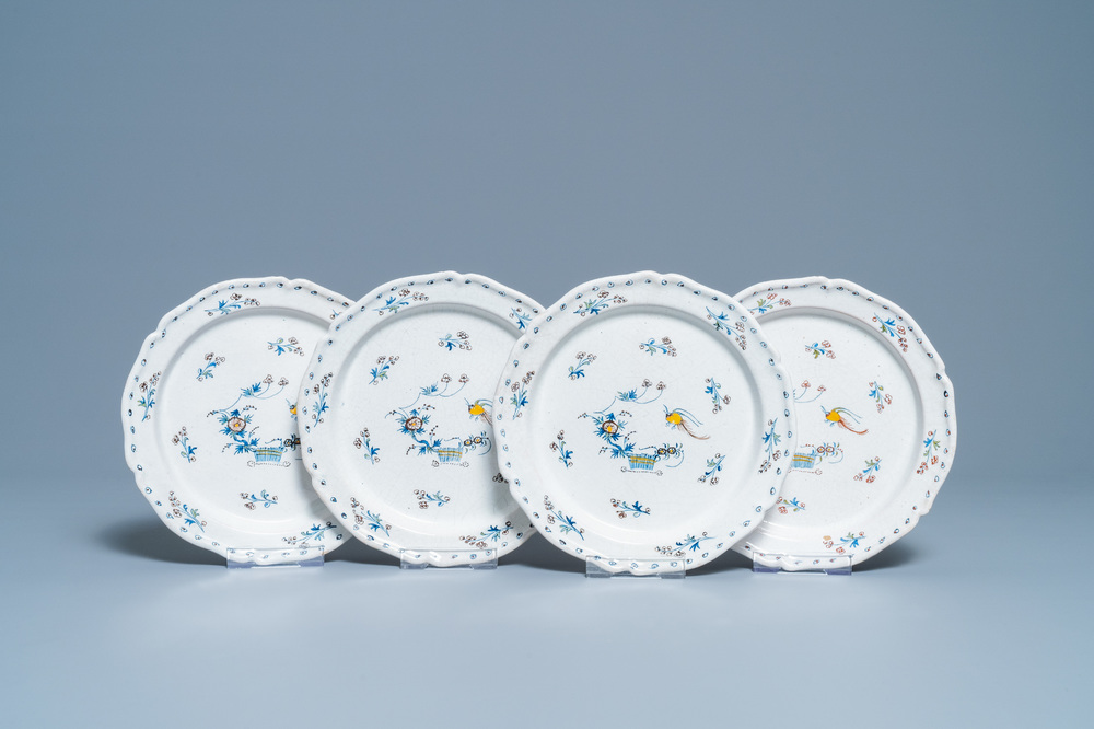 Four Brussels faience plates with '&agrave; la haie fleurie' design, 18th C.