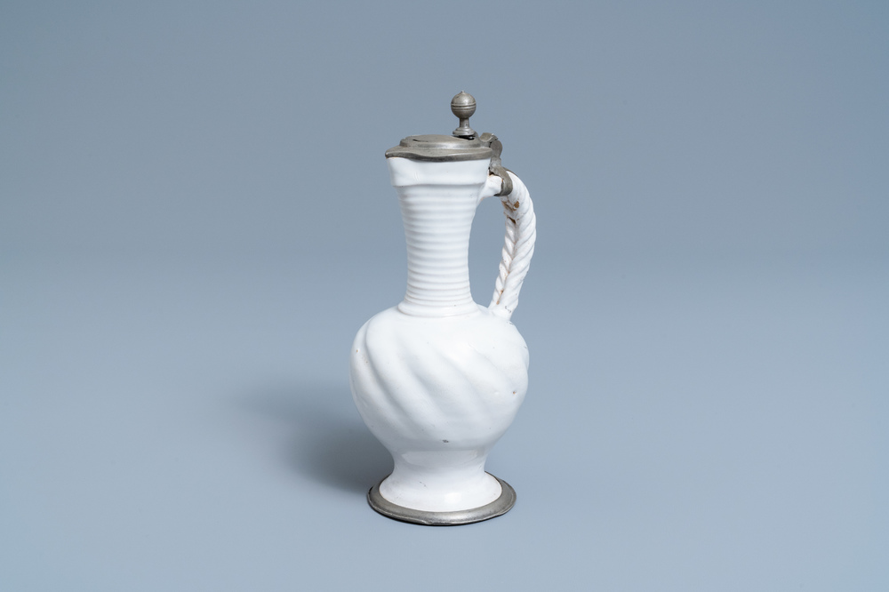 A pewter-mounted white Dutch Delftware jug, 17th C.