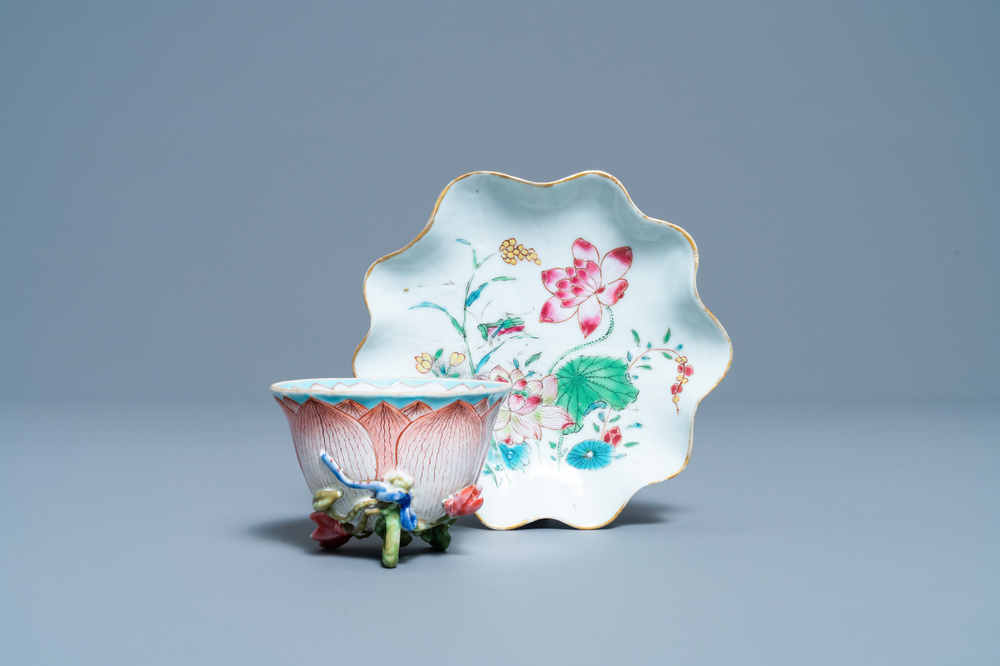 A Chinese famille rose 'lotus' cup and saucer with applied design, Yongzheng