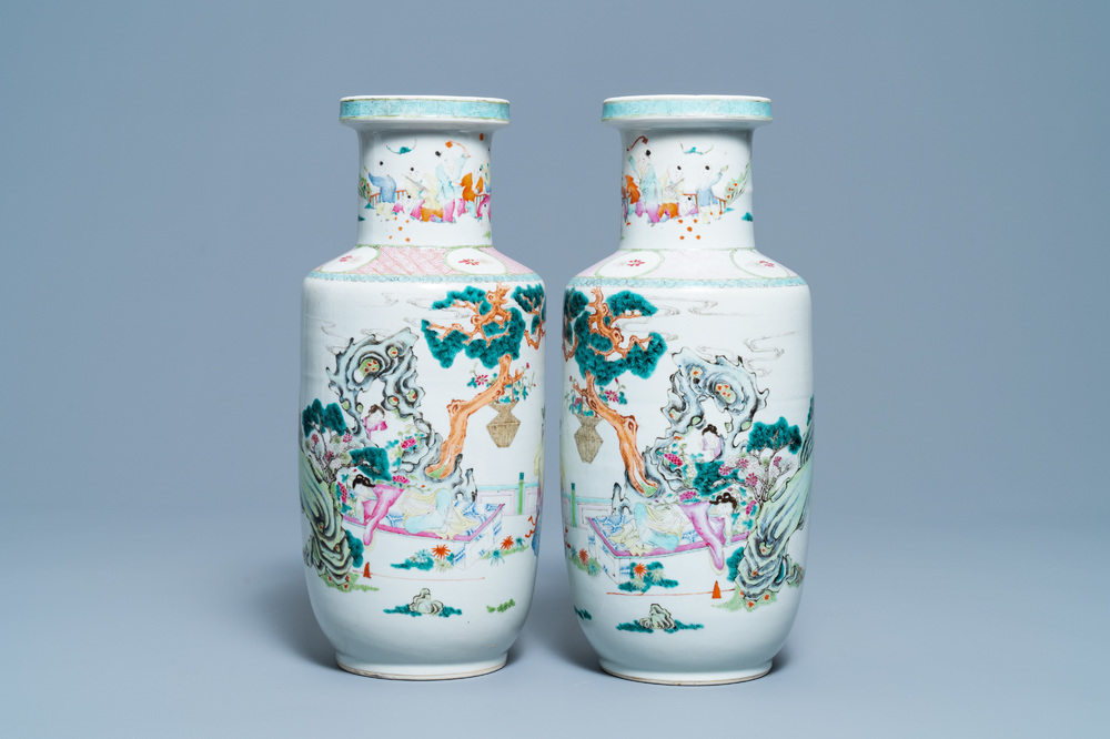 A pair of Chinese famille rose rouleau vases with immortals, 19/20th C.