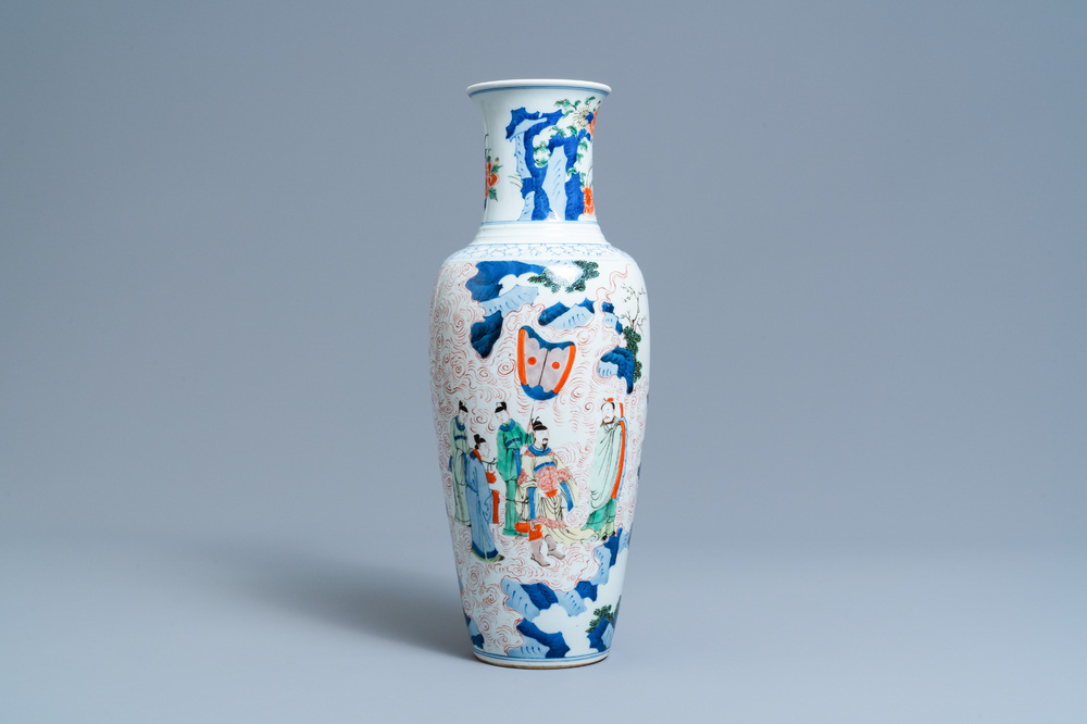 A Chinese wucai vase with continuous figurative design, 19th C.