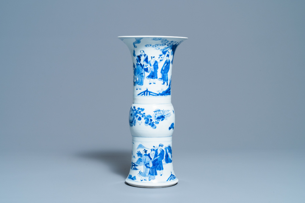 A Chinese blue and white 'gu' vase with immortals, Kangxi