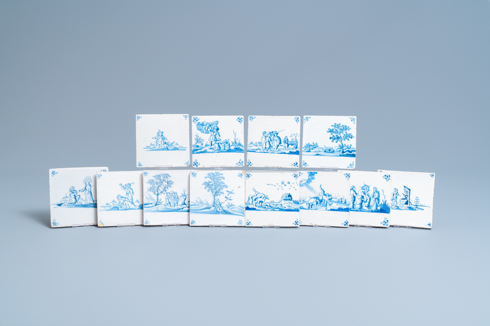 Twelve Dutch Delft blue and white biblical tiles, 17/18th C.