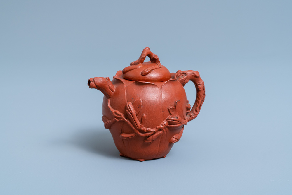 A Chinese Yixing stoneware lotus-shaped teapot and cover, Kangxi