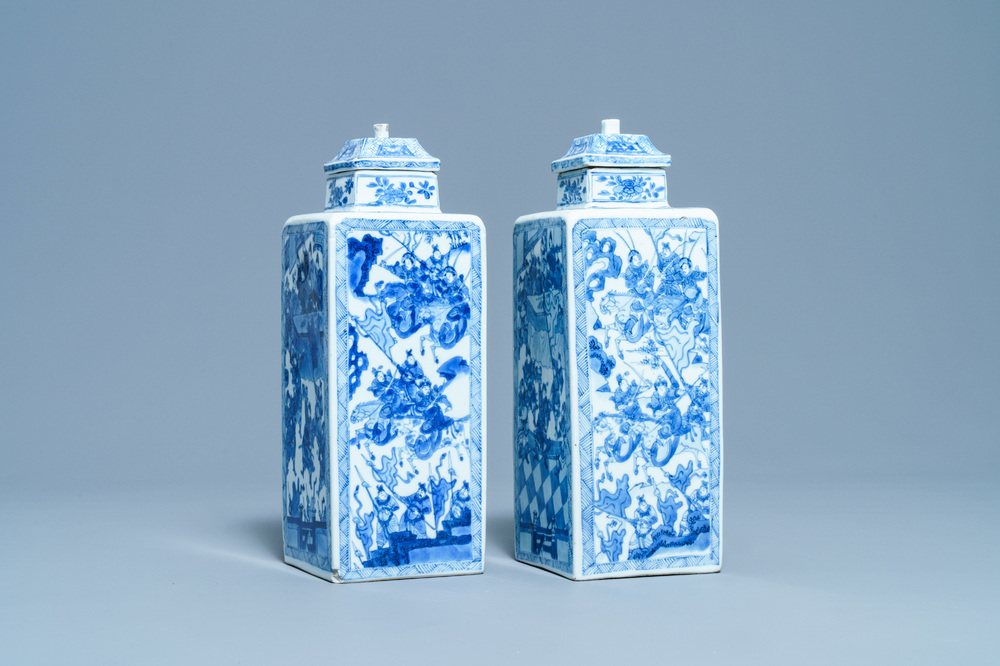 A pair of Chinese blue and white square vases and covers, Kangxi